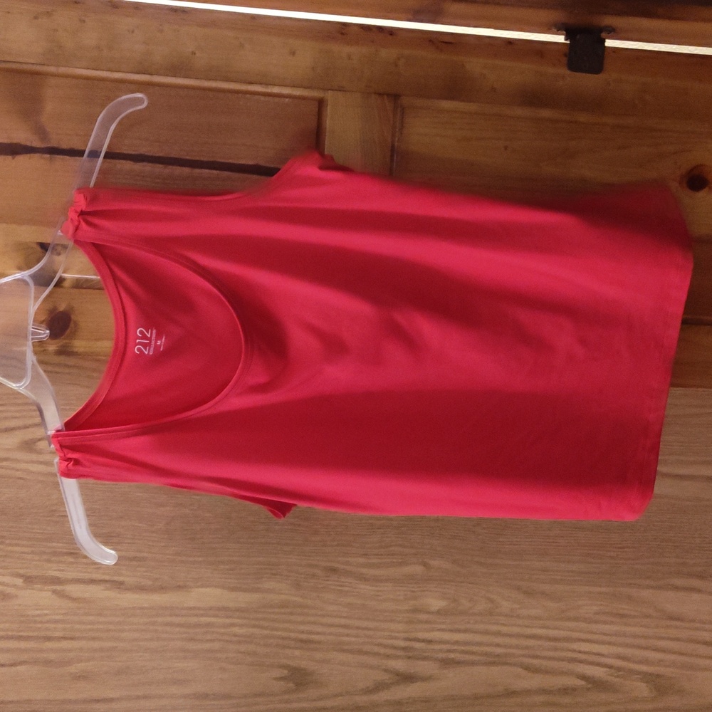 212 collection, size medium, and the color is a pinkish red